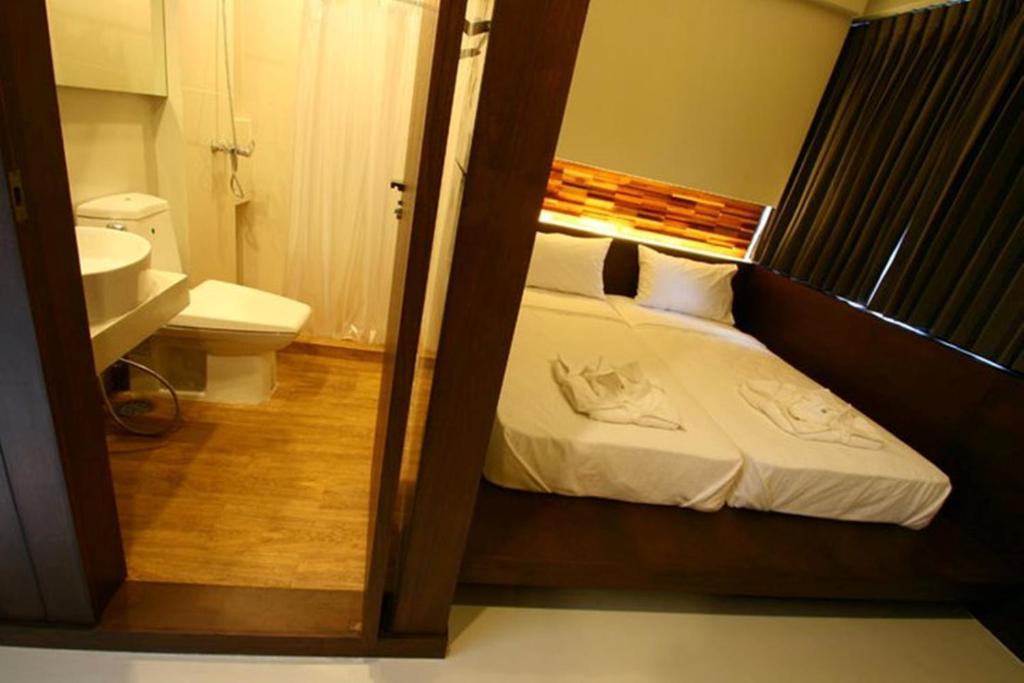 At One Inn Hualampong Bangkok Chambre photo